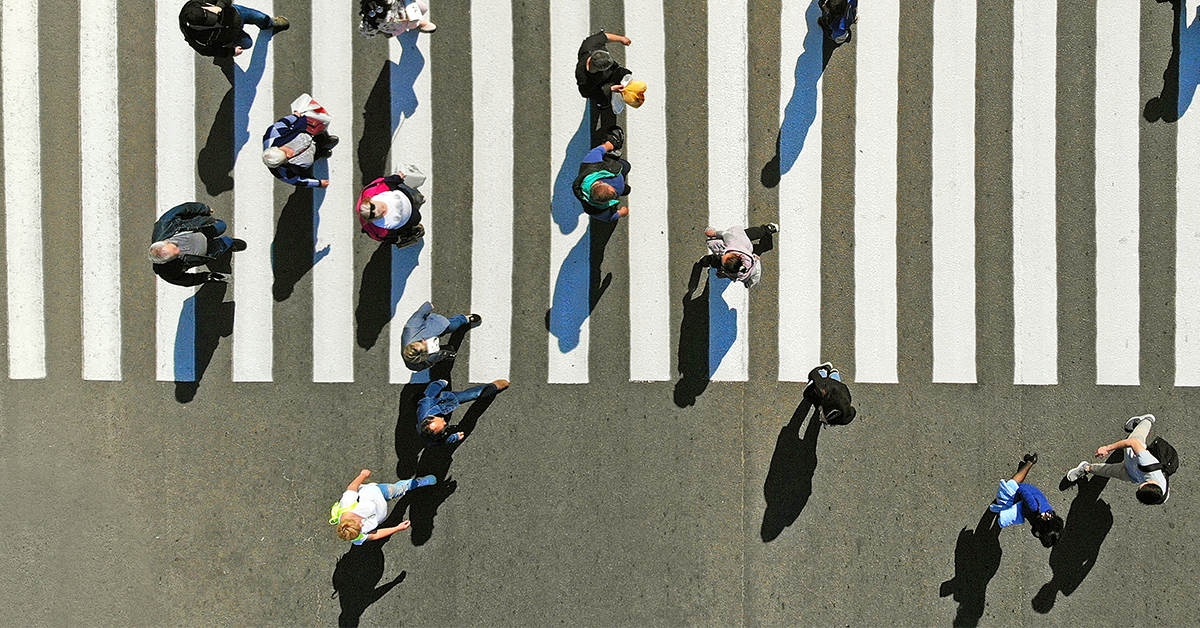 People crossing crosswalk 